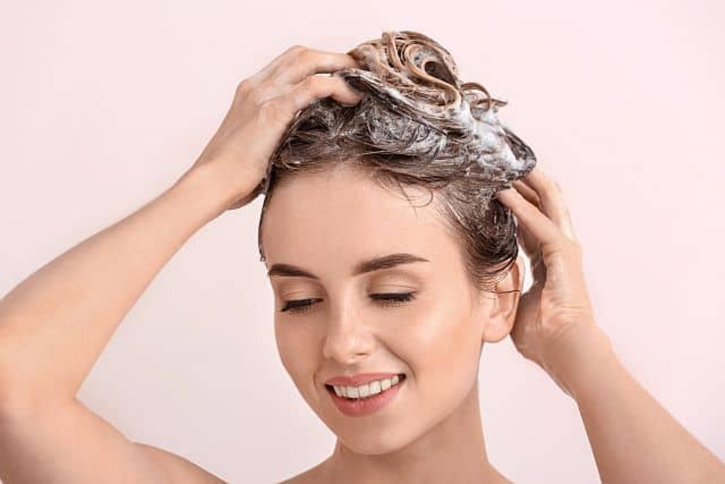 Girl Doing Shampoo to Reduce Natural Hair Shrinkage